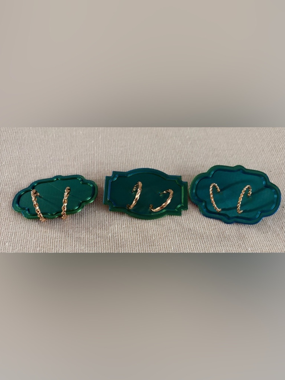 Three pair Gold-Tone Twisted Hoop Earrings in Emerald Green Display Set